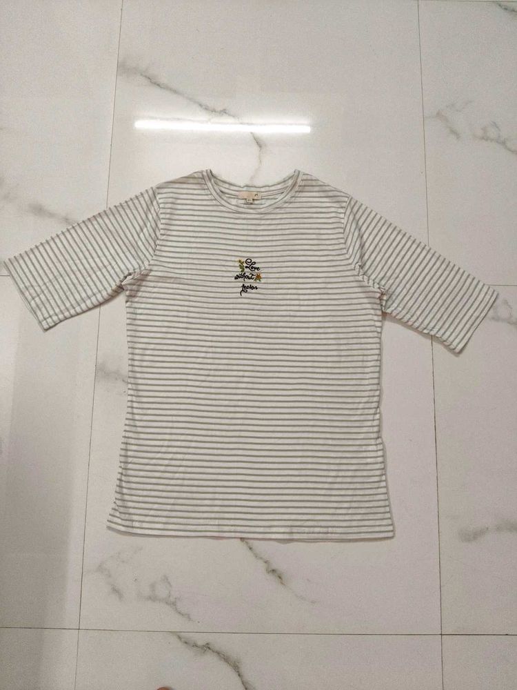 stripped off white top with thread embroidery