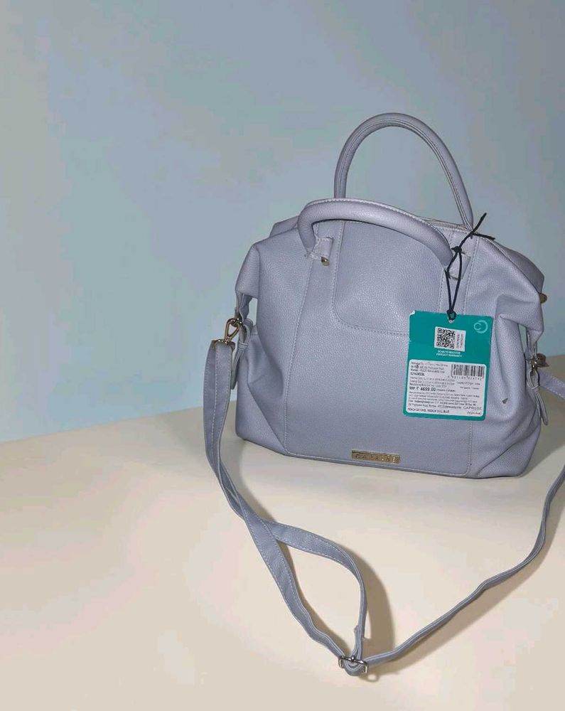 Caprese Peach satchel medium dull blue handbag