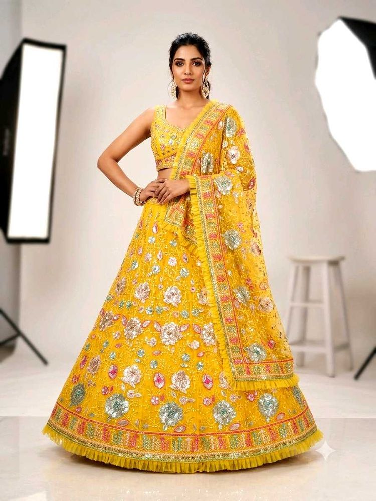 Stunning Yellow Embellished Lehenga Choli