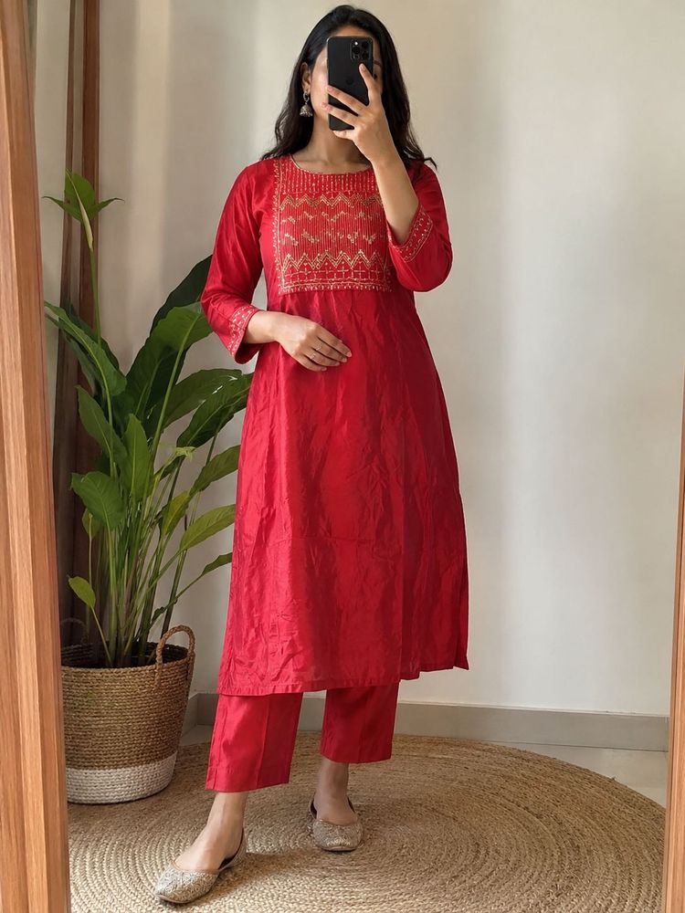 Elegant Red Kurta with Embellished Neckline