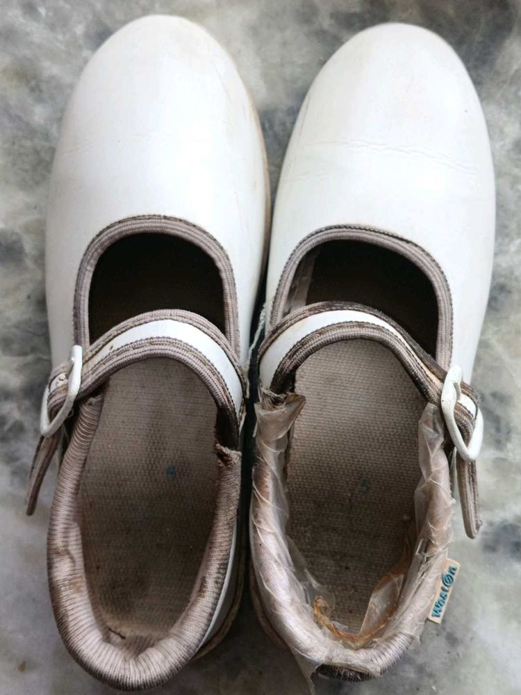 White girl's school shoes