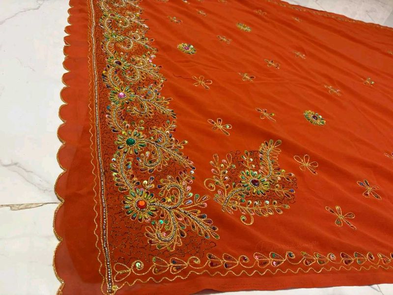 Embroidered rust Orange Saree