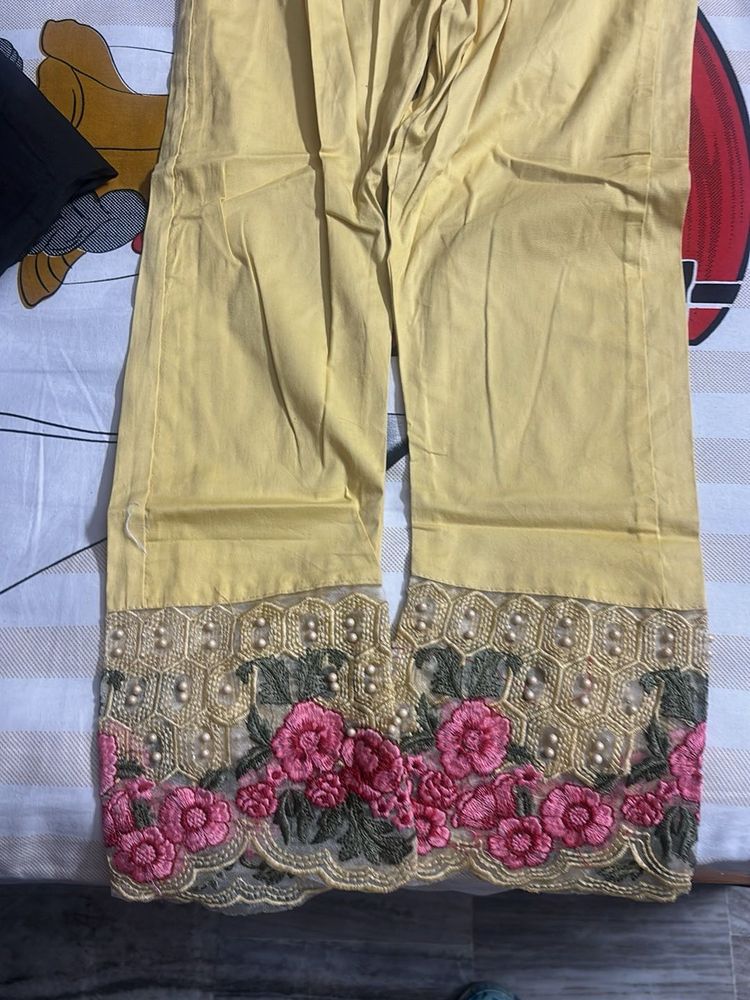 Elegant Yellow Palazzos with Floral Embroidery