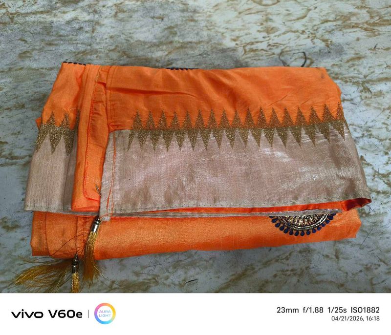 Vibrant Orange Saree with Golden Border
