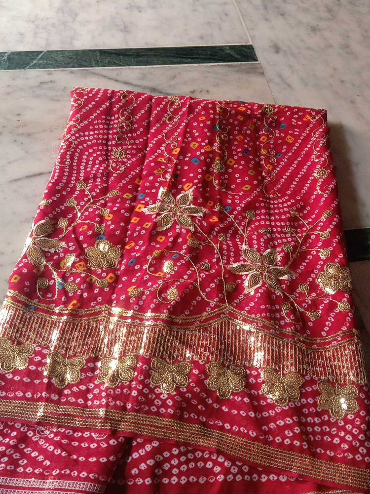 Stunning Bandhani Saree with Intricate Embellishme