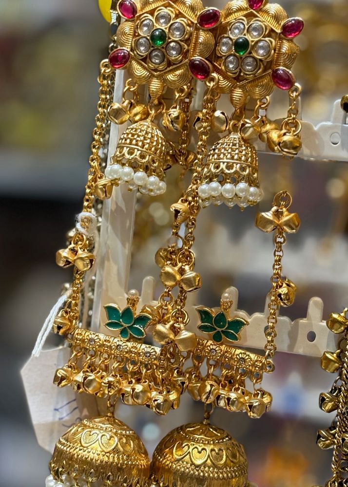 Exquisite Gold Jhumka Earrings with Pearls