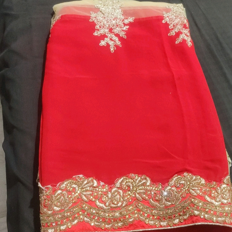 beautiful upper half red and lower glod saree with
