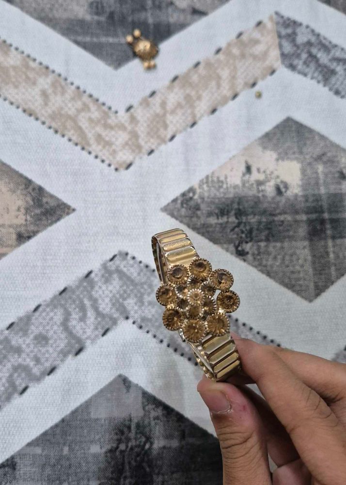 Sparkling Gold Bangle with Stones