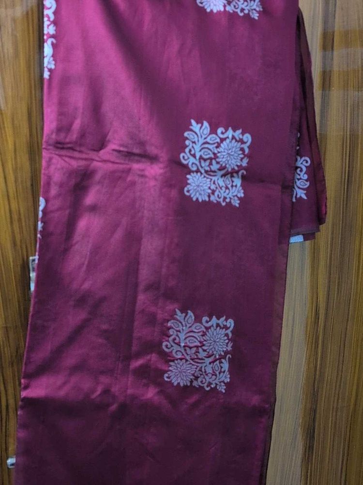 Maroon Silk Saree with Floral Motifs