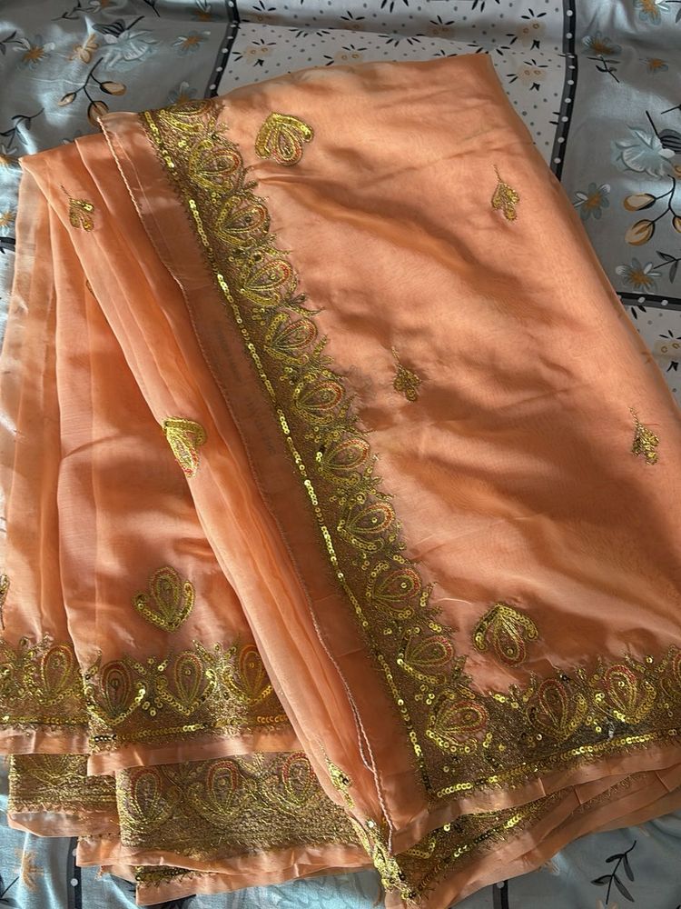 Elegant Peach Saree with Embellishments
