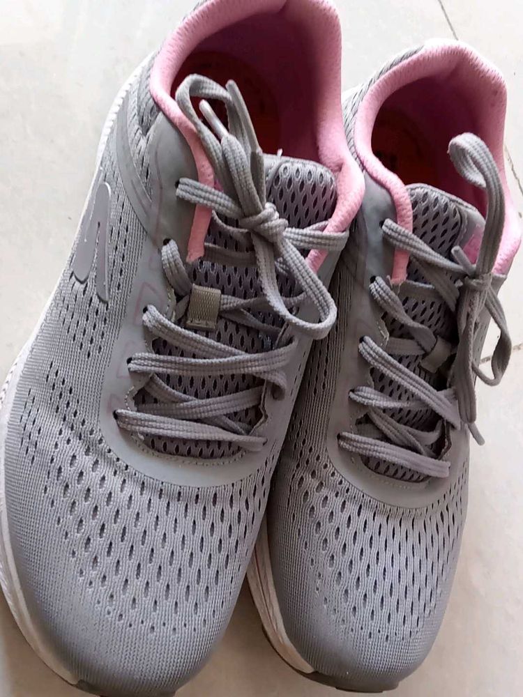 Gray Running Shoes with Pink Accents