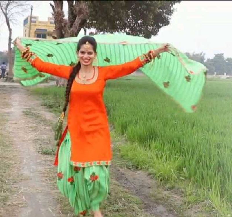 get free green paranda Orange Salwar Kameez