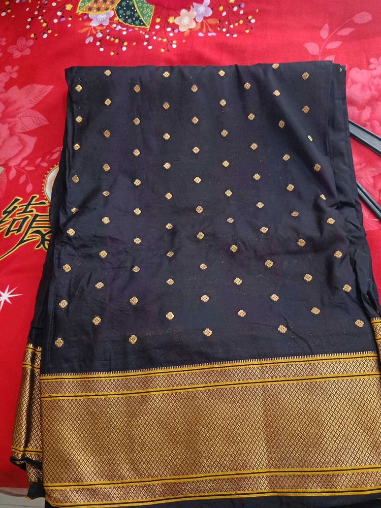 Elegant Black Saree with Gold Border