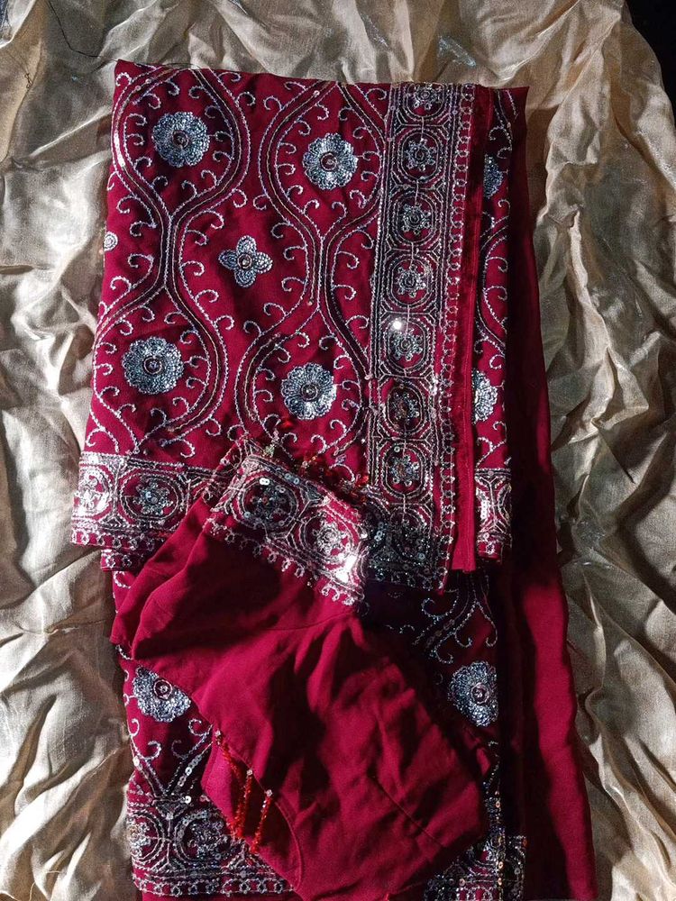 Elegant Maroon Embroidered Saree