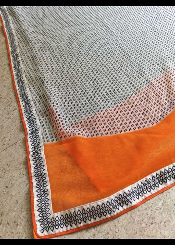 Elegant Printed Saree with Orange Border