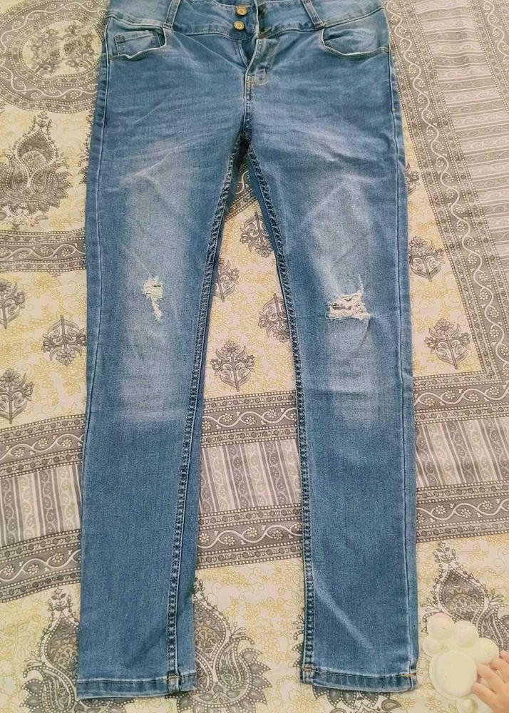 Distressed Blue Skinny Jeans