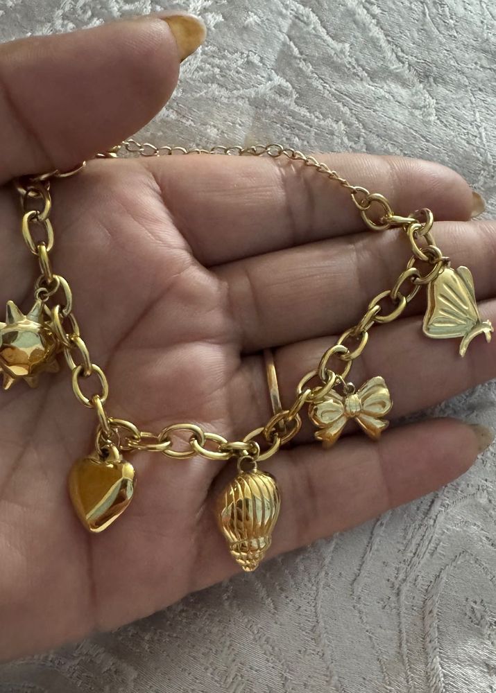 Charming Gold Tone Charm Bracelet