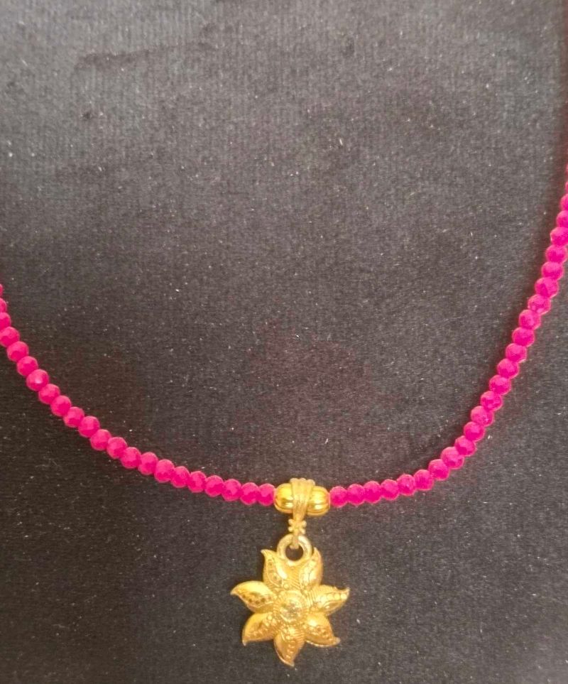 Beaded Necklace with Gold Flower Pendant