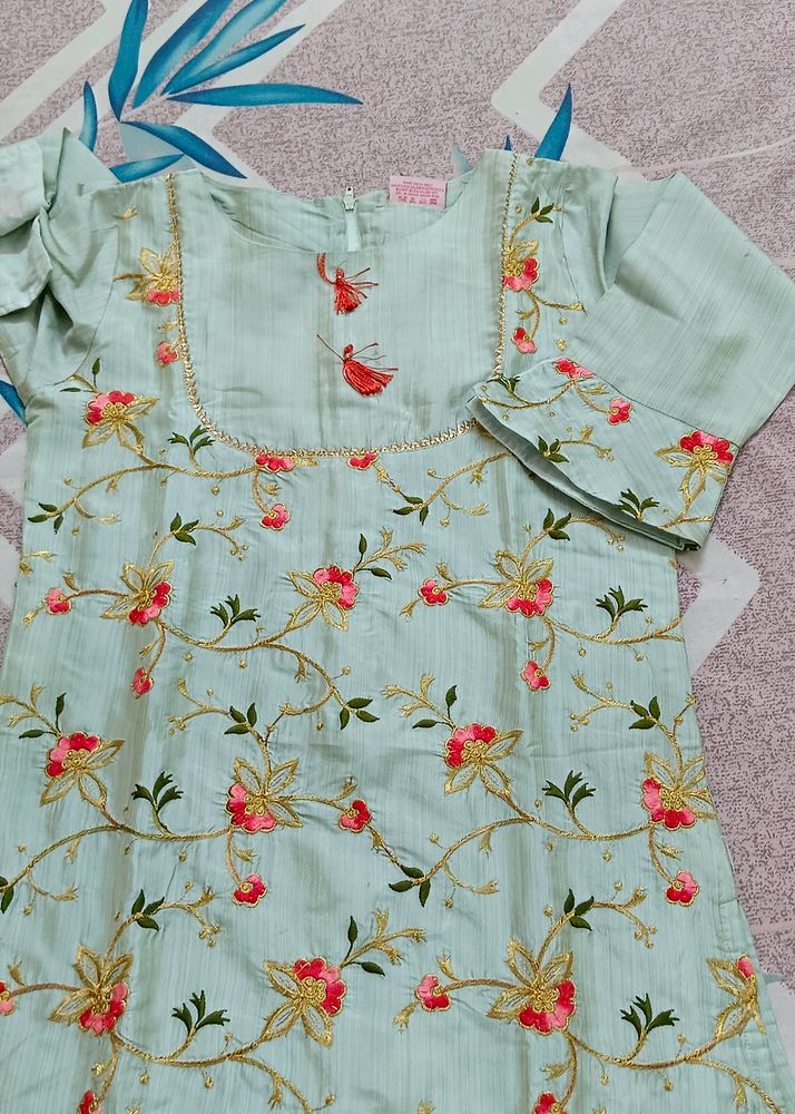 Elegant Mint Green Embroidered Kurti