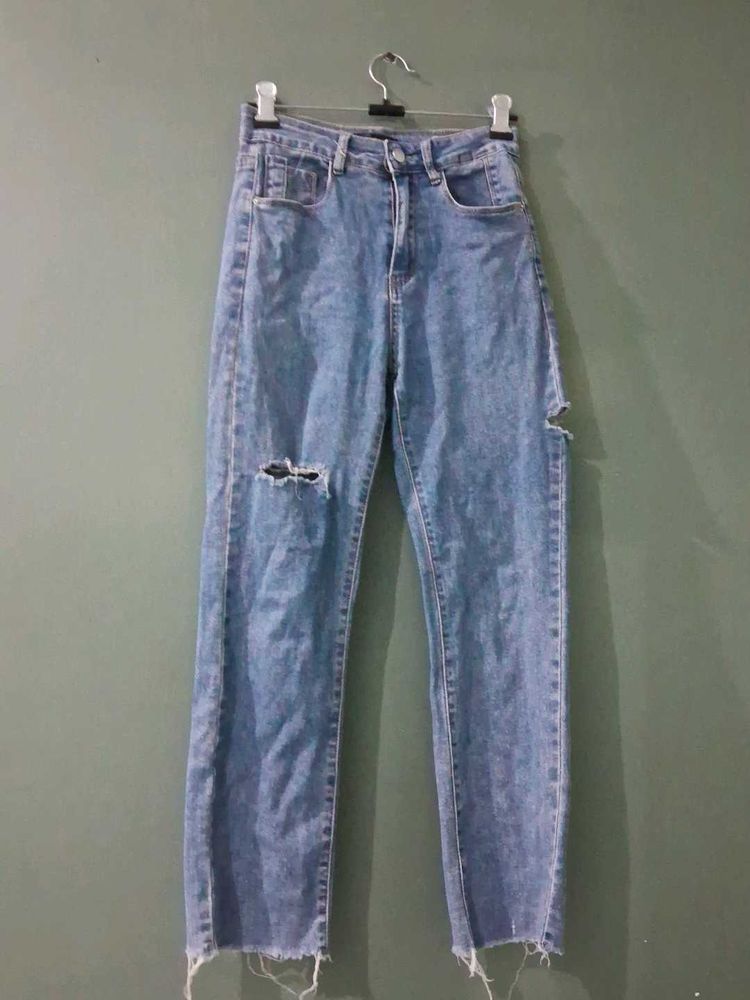 Distressed Blue Denim Jeans