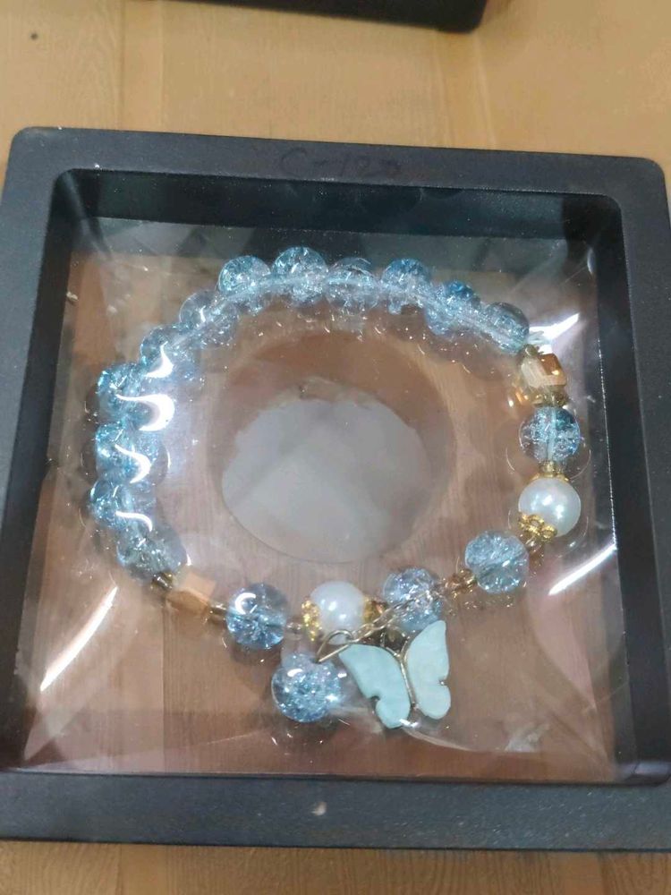 Blue Beaded Bracelet with Butterfly Charm
