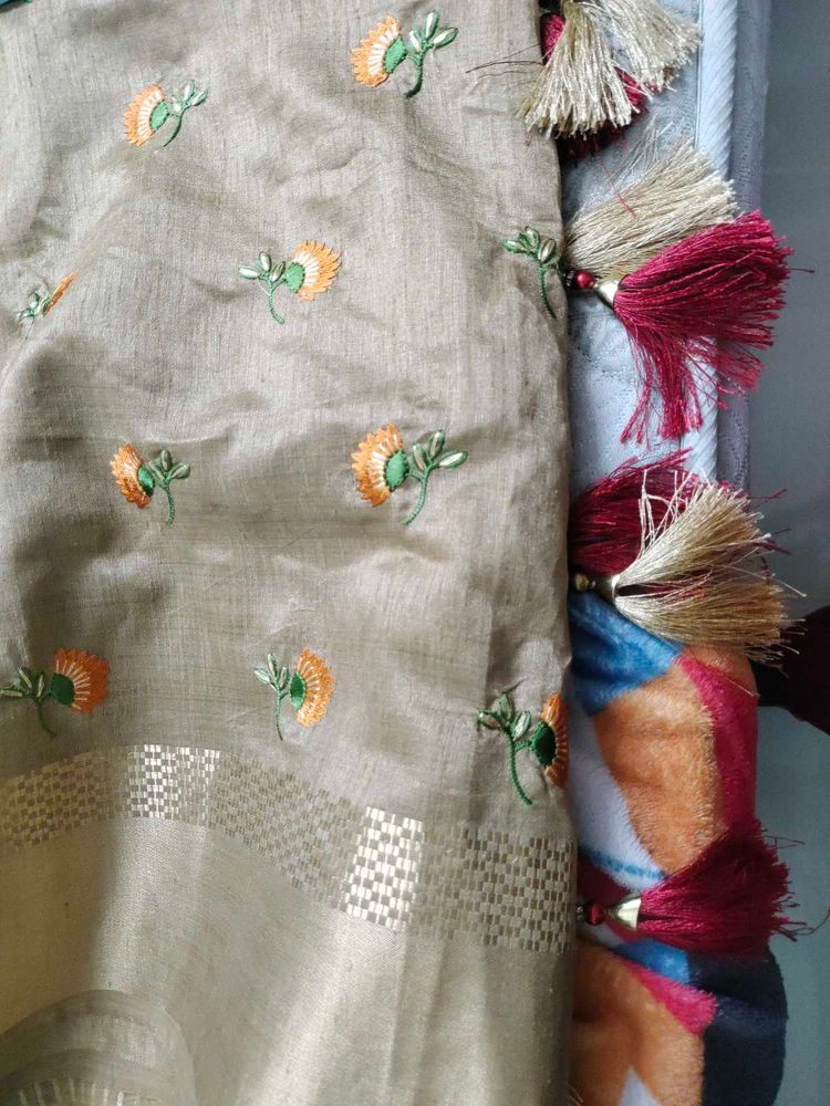 Elegant Embroidered Tassel Saree