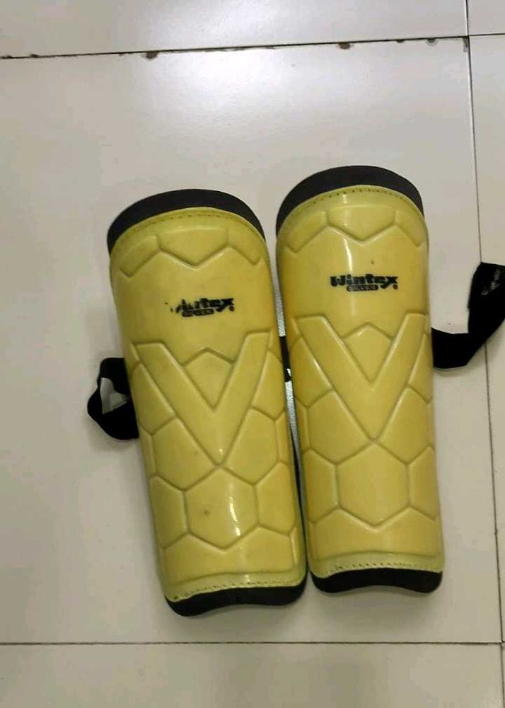 Yellow Shin Guards for football players