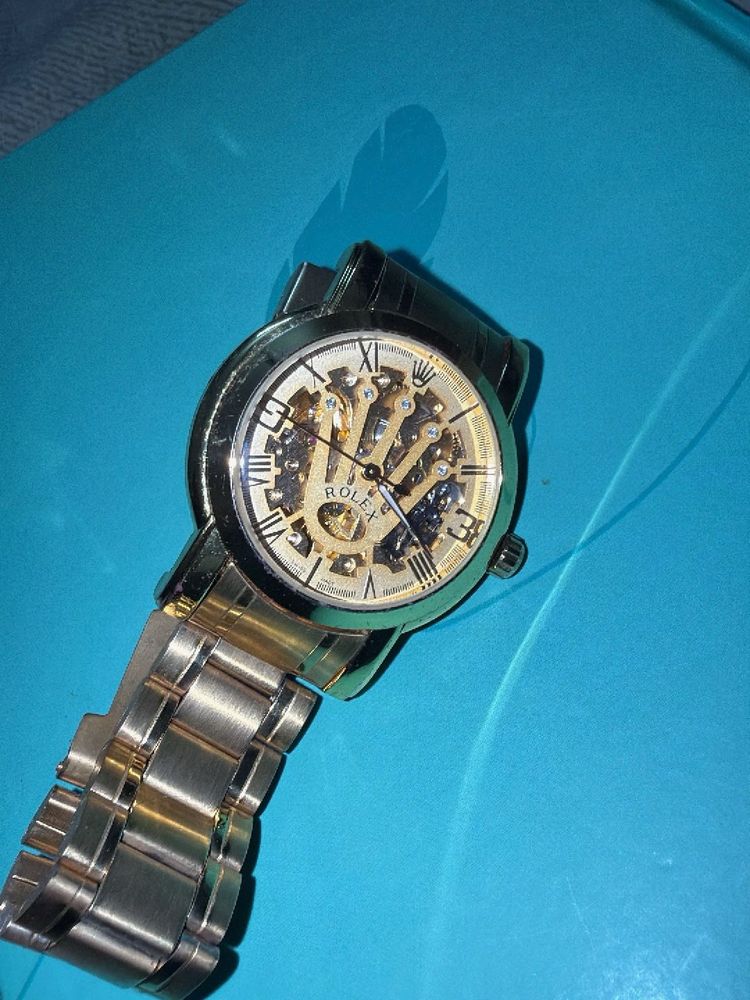 Gold Rolex Skeleton Watch