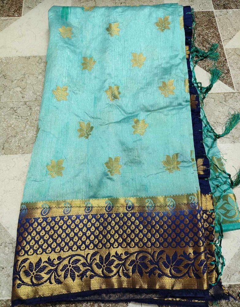 Beautiful Teal Saree with Gold Floral