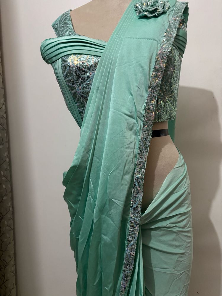 Elegant Mint Green Saree with Embellished Blouse