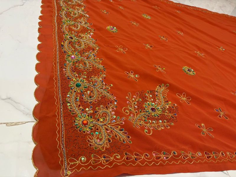 Embroidered rust  Orange Saree