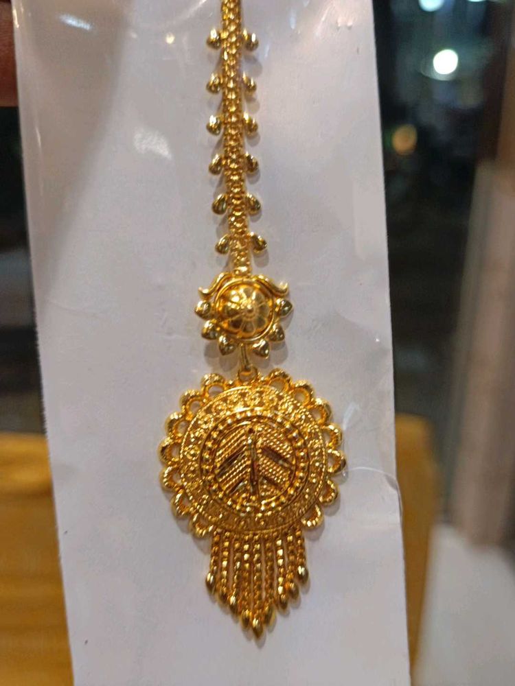 gold plated tika