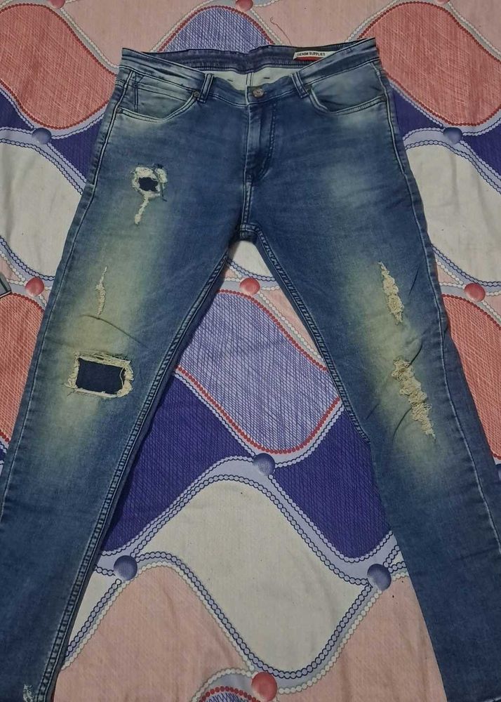 Men's Distressed Blue Jeans