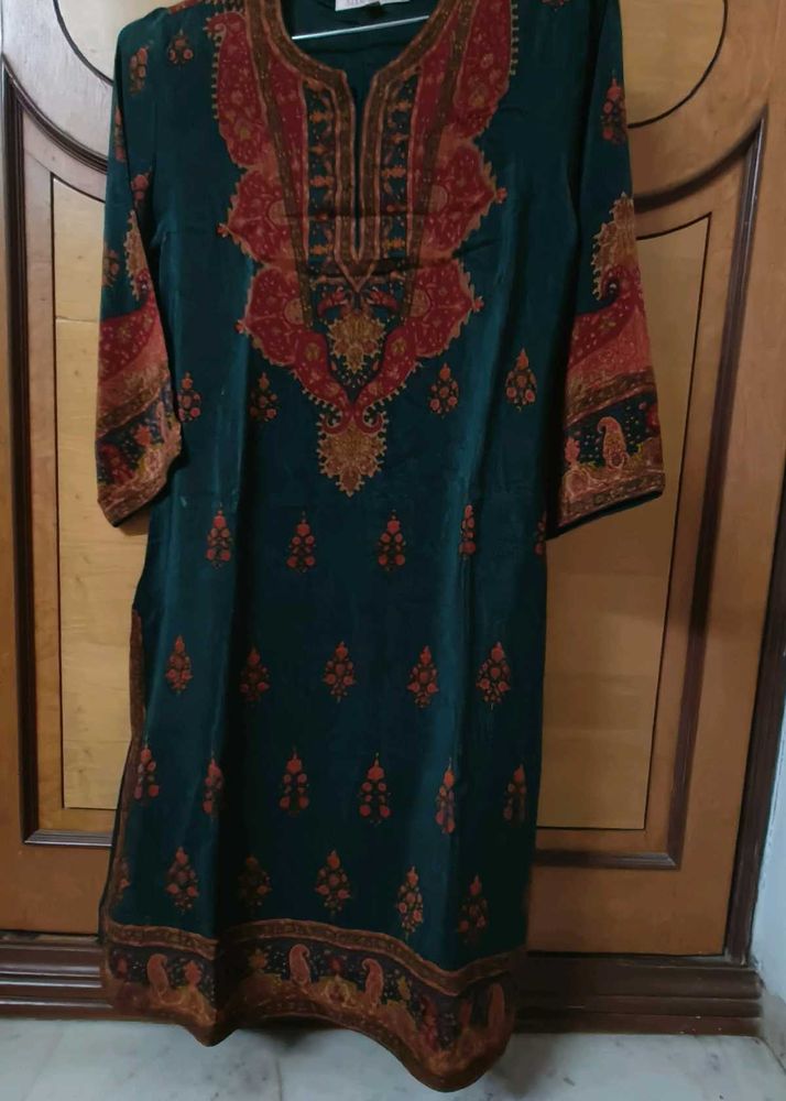 Green Kurta with Intricate Red Embroidery