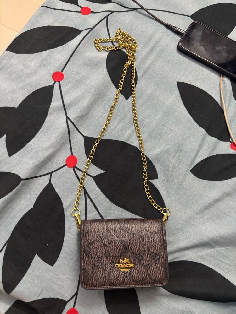 Coach Monogram Mini Bag