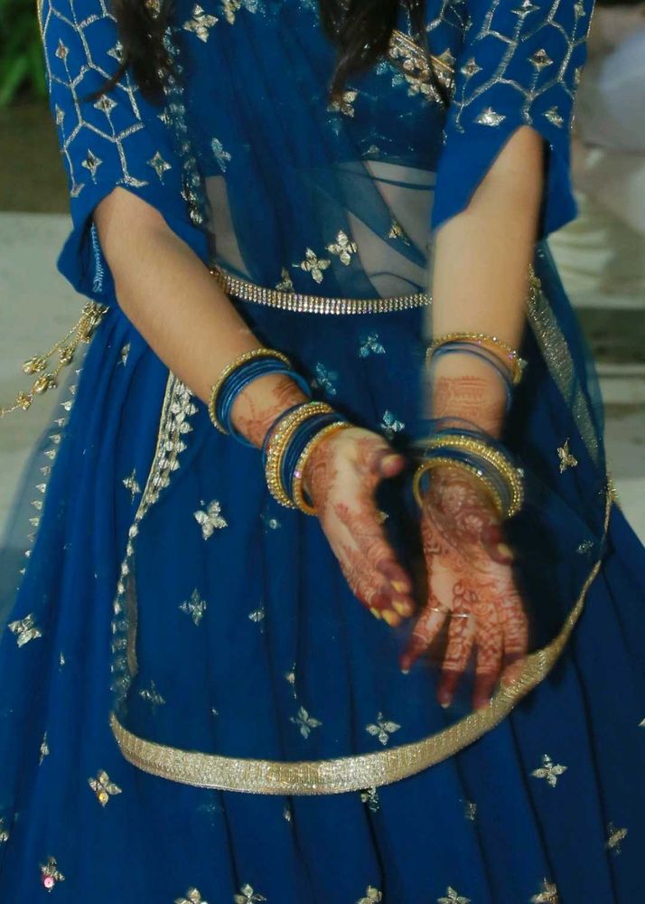 Stunning Teal lengha choli with Silver Embellishme