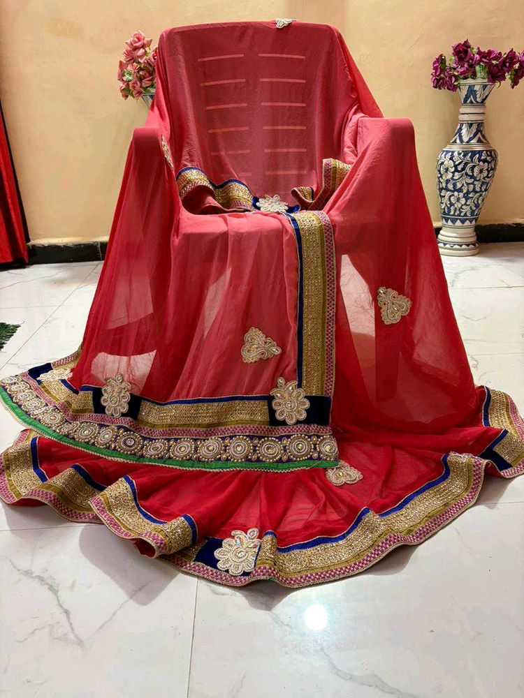 Elegant Red Embroidered pearl work Saree