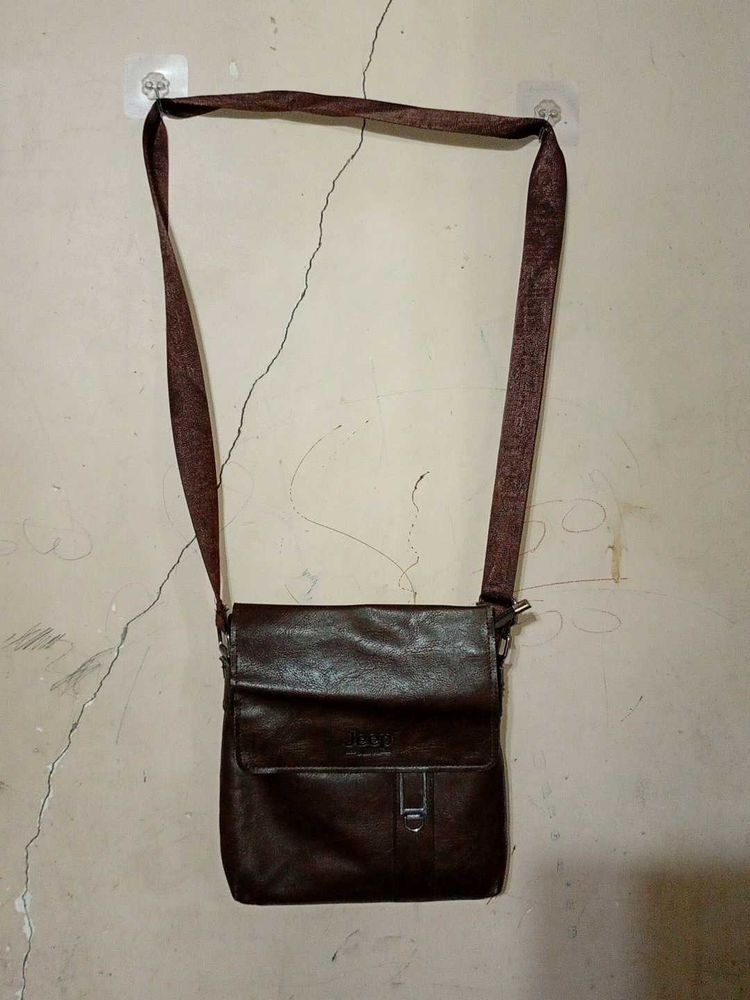 Brown Leather sling purse