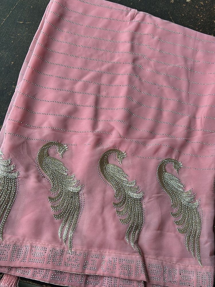 Elegant Pink Saree with Peacock Motif