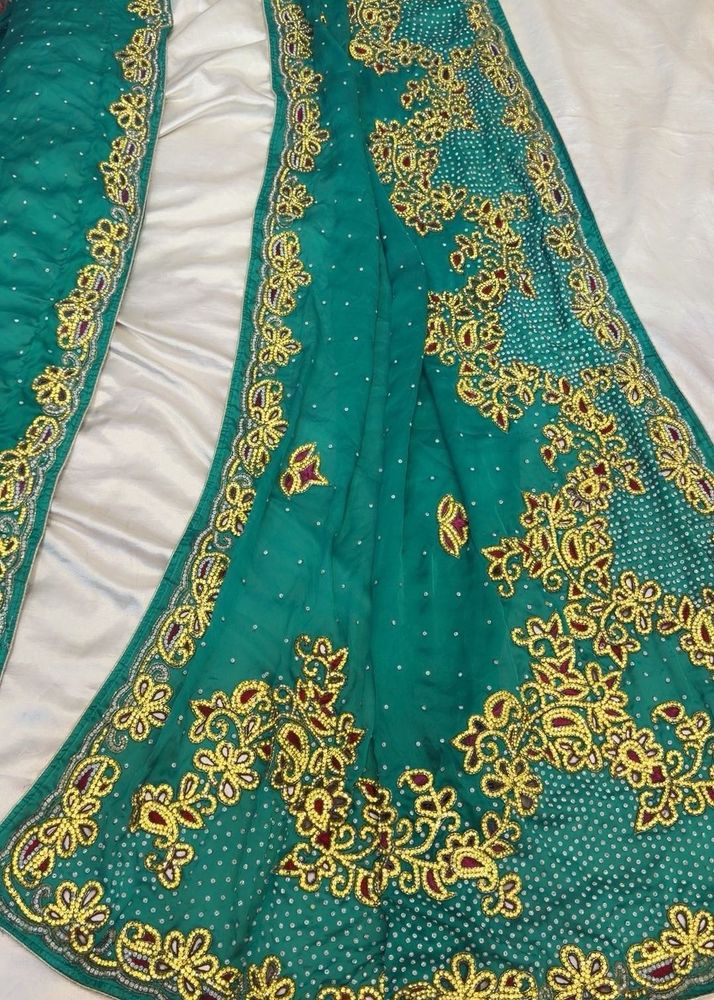Embroidered Teal Green Saree