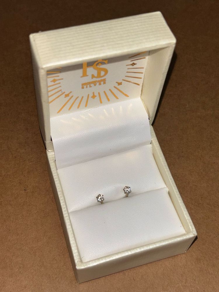 92.5% sterling sliver studs with certificate
