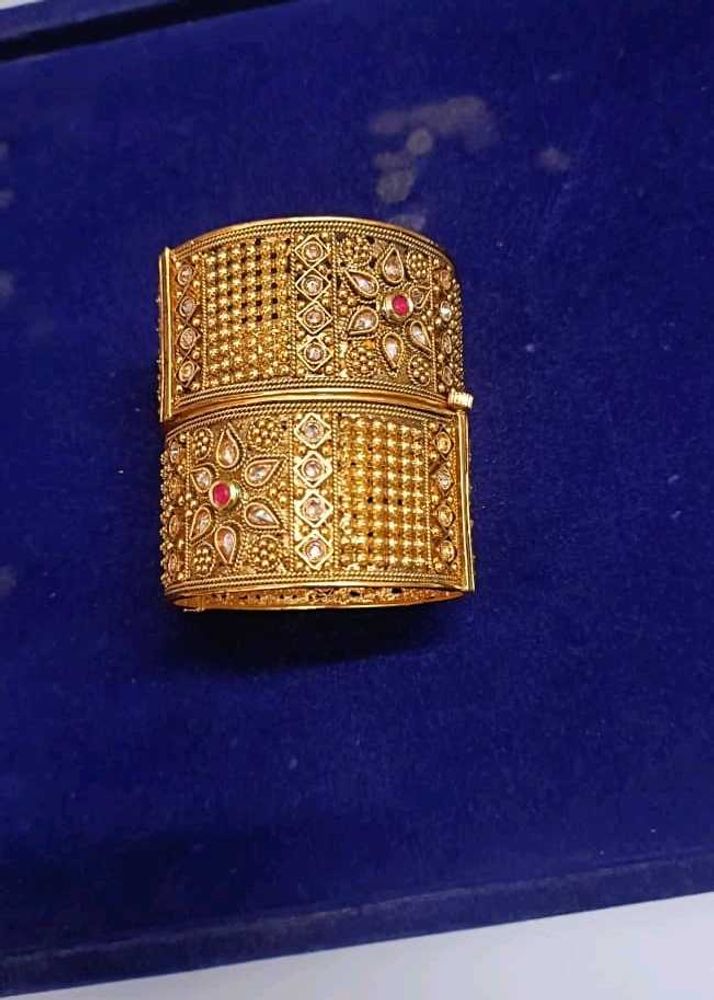 Exquisite Gold Bangle with Stones