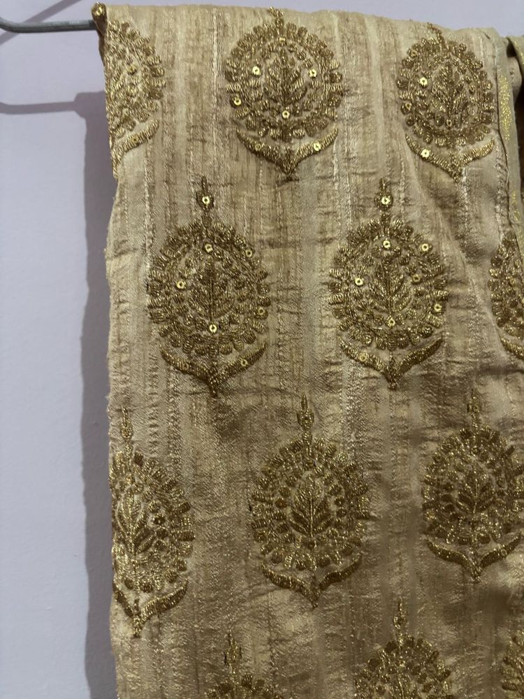 Golden Embroidered dress material