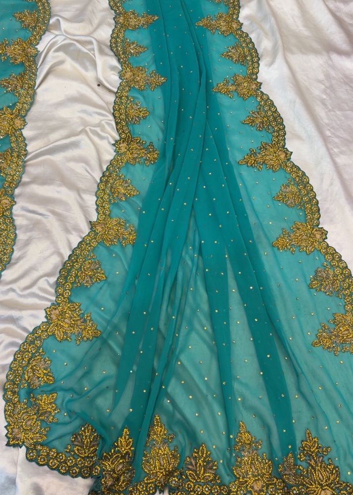 Stunning Teal Saree with Gold Embroidery