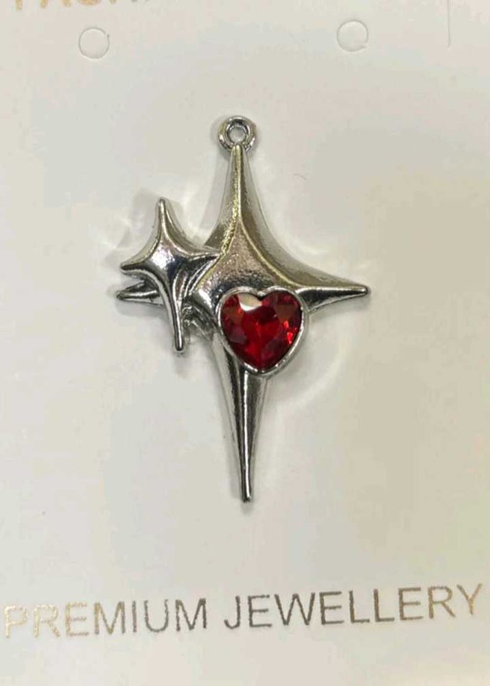 Stunning double Star Pendant with Red Heart Gem