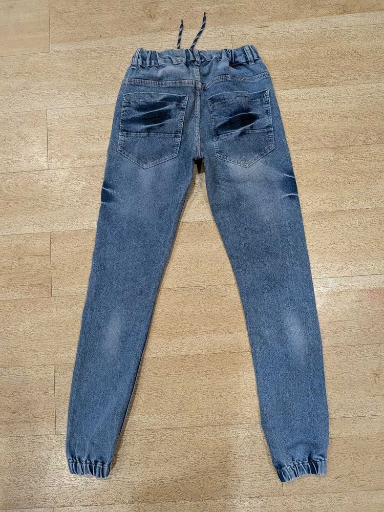 Distressed Denim Jogger Jeans