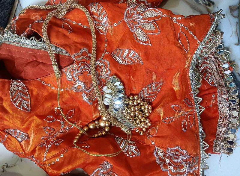 Designer Orange gold lehnga choli