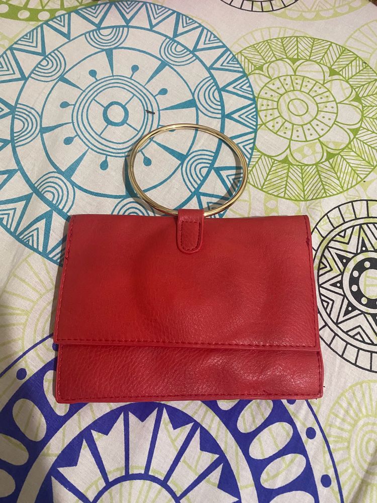 Red Ring Handle Clutch