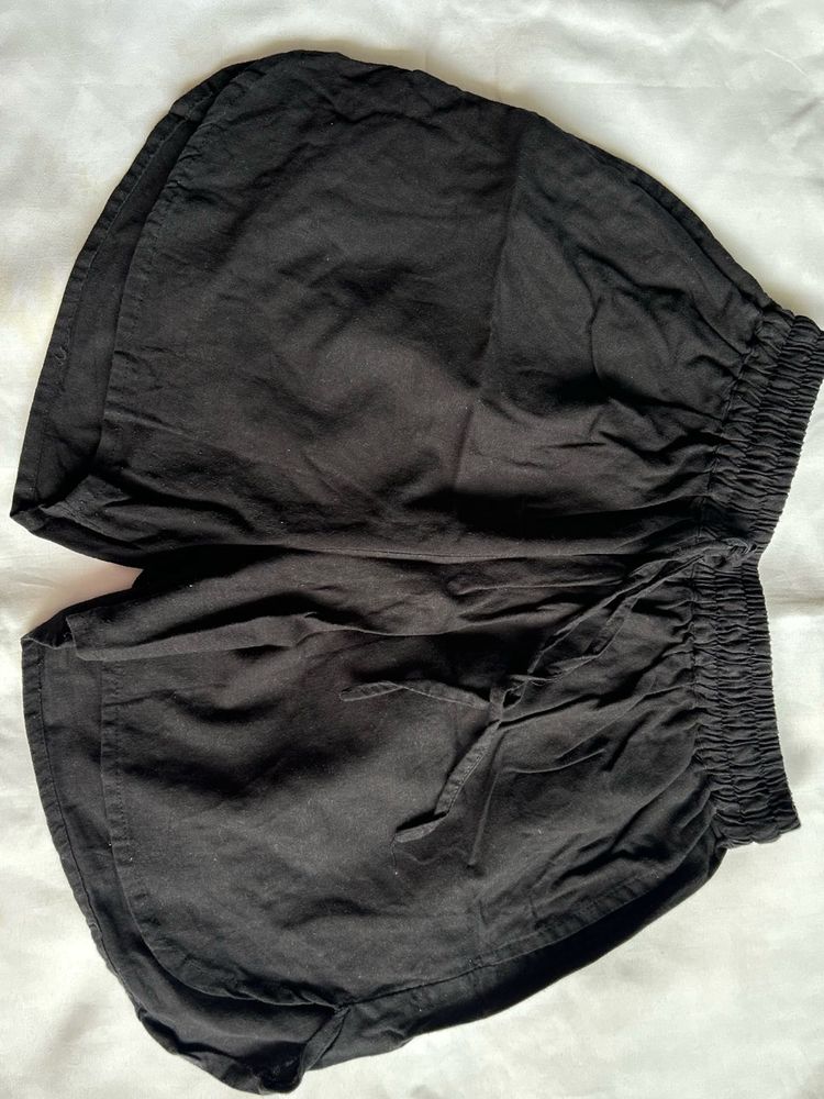 Apple cut black shorts