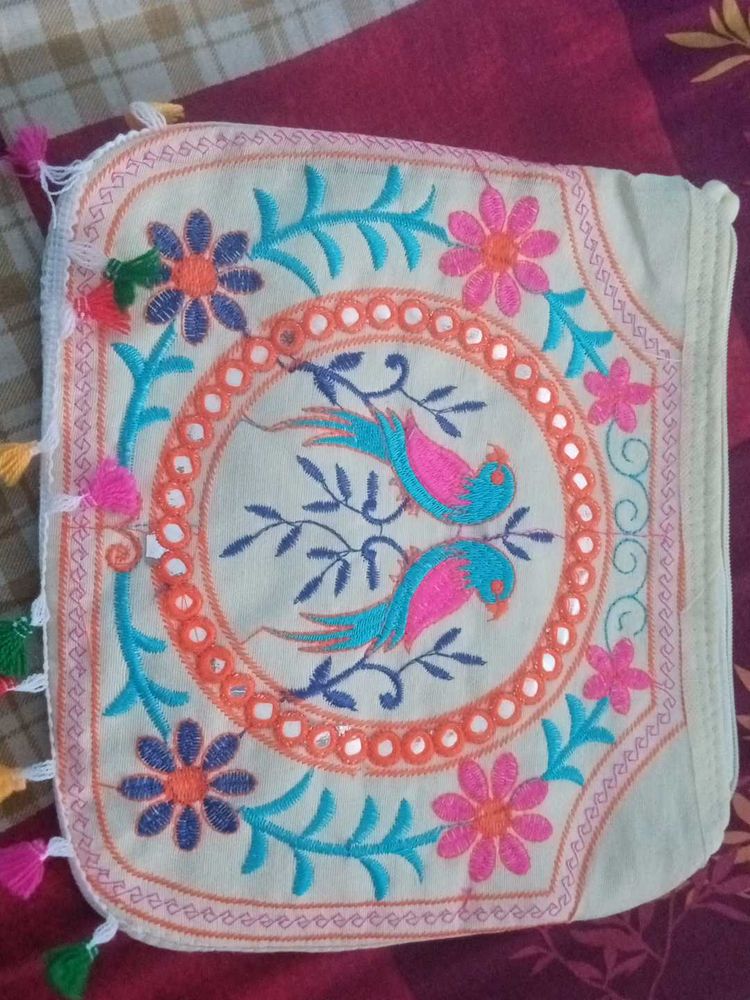 Embroidered Clutch with Tassels